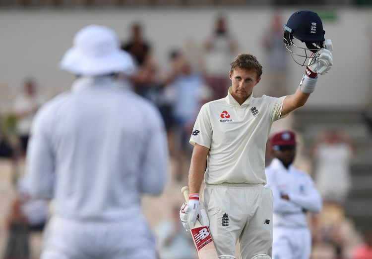 England captain Joe Root celebrates reaching his 100 during Day Three of the Third Test match between the West Indies and England