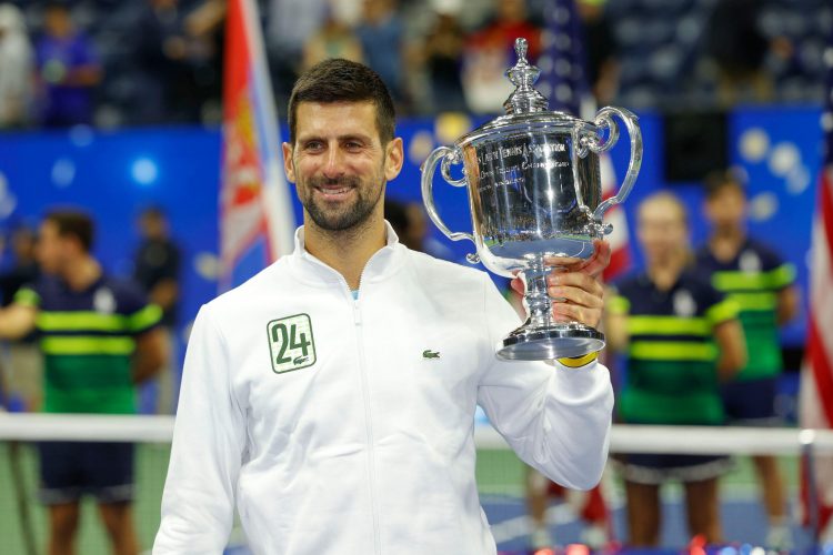 New York, USA, 10th,September, 2023. Serbian tennis player Novak Djokovic holds the US Open 2023 trophy after the historic 24th. Grand Slam win at the Billie Jean King National Tennis Center on Sunday 10 September 2023.© Juergen Hasenkopf / Alamy Live