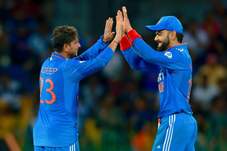Colombo, Sri Lanka. 11th September 2023. India's Kuldeep Yadav (L) and Virat Kohli celebrate their team's victory at the end of the Asia Cup 2023 super four one-day international (ODI) cricket match between India and Pakistan at the Premadasa Stadium in C